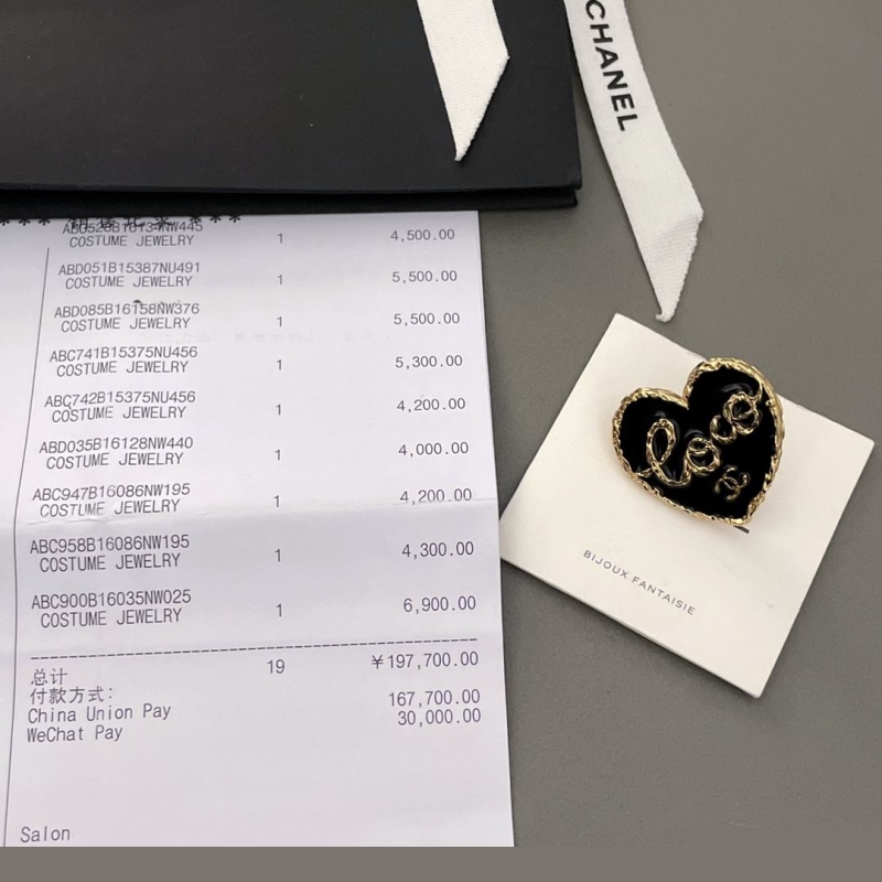 Ch*el brooches